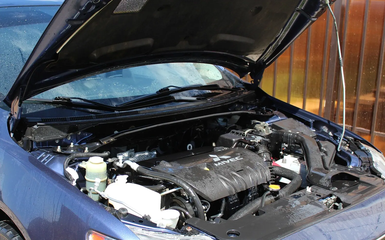 Motor, metal and vehicle