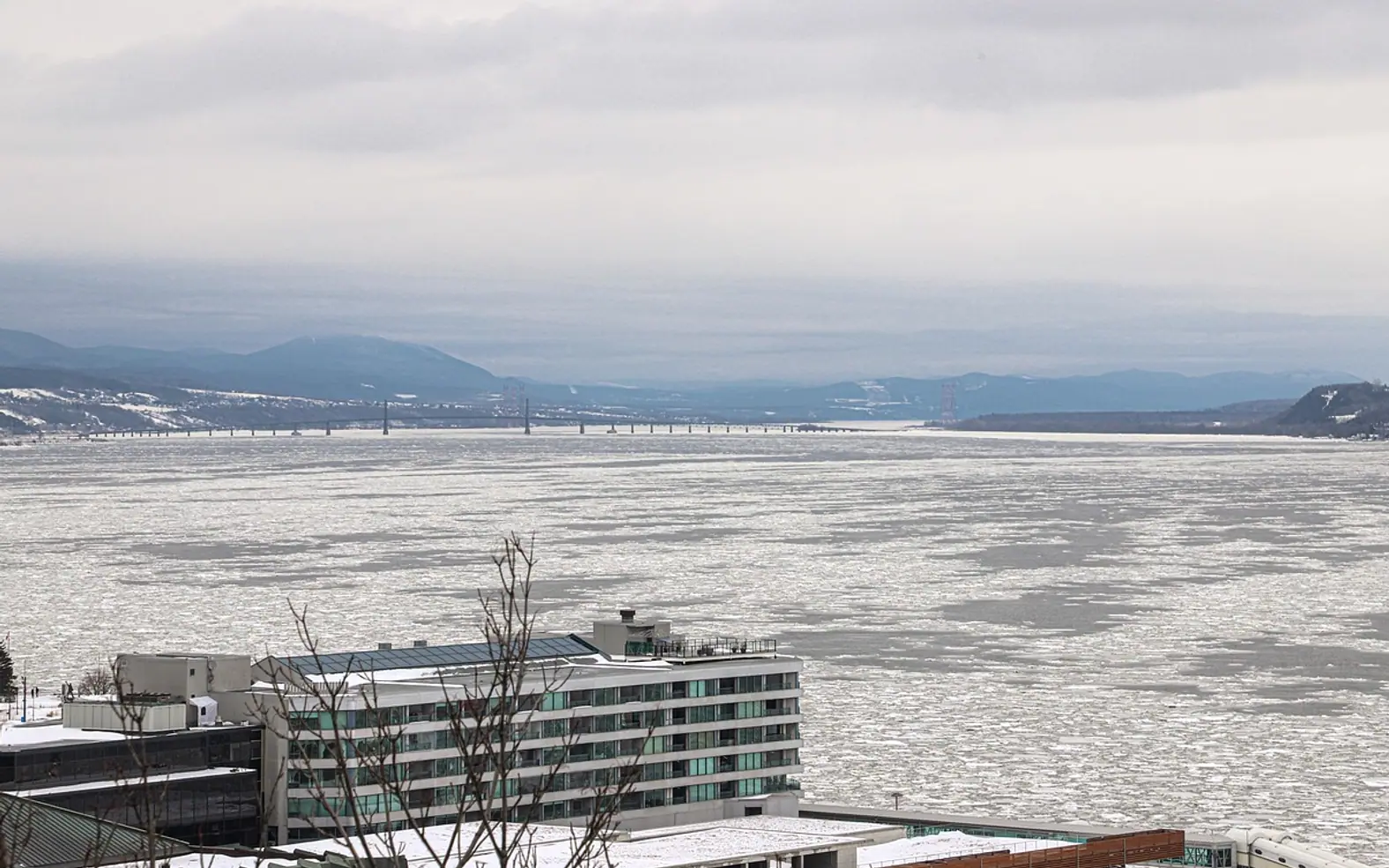 Frozen river, winter and city